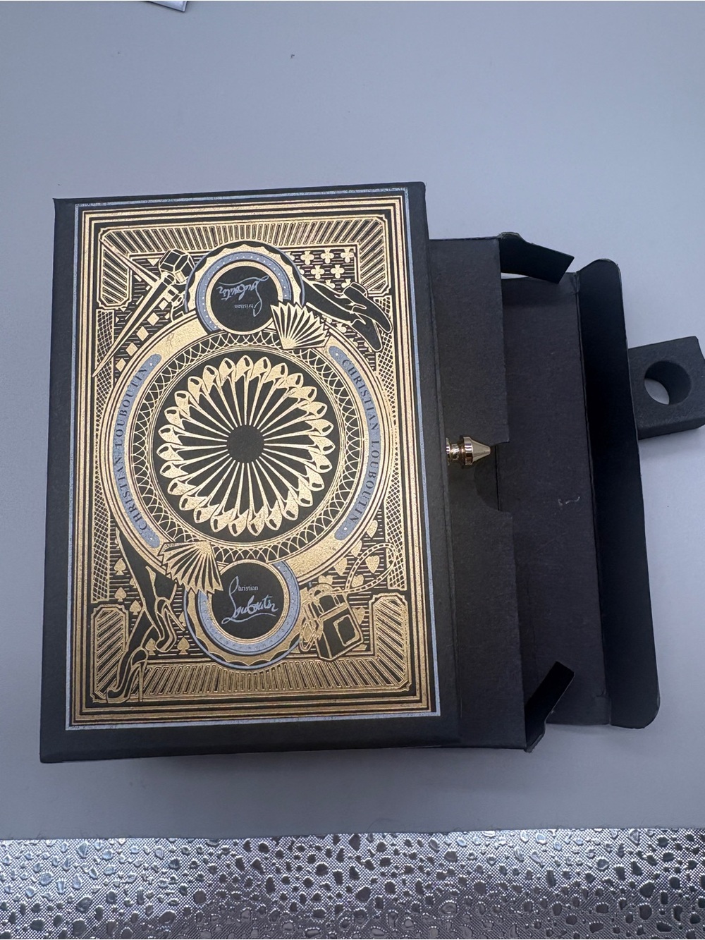 Christian Louboutin rare limited edition playing cards featuring intricate gold